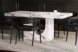 Bryce white marble-look dining table with arched base in a dark panelled dining room