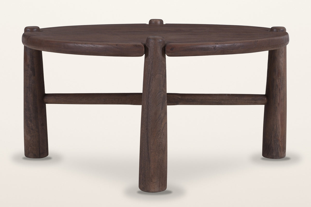 Buonconvento coffee table in dark walnut, front view: a thick round top, three of its four legs and a low stretcher