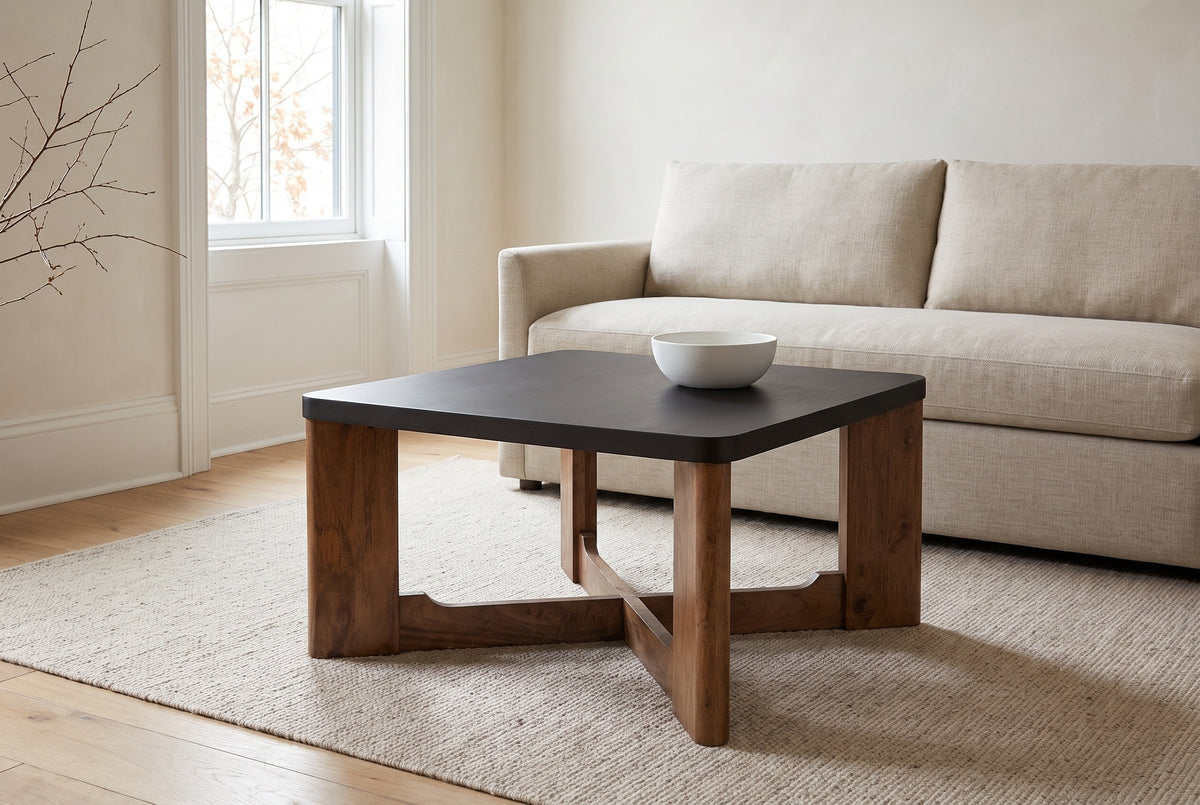 Calcata coffee table in front of an oatmeal linen sofa in a Glebe, Ottawa living room, a white bowl on the mocha top