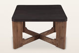Calcata coffee table seen from the front: a mocha top on four plank legs and a low X stretcher