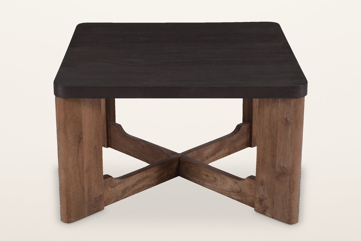 Calcata coffee table seen from the front: a mocha top on four plank legs and a low X stretcher