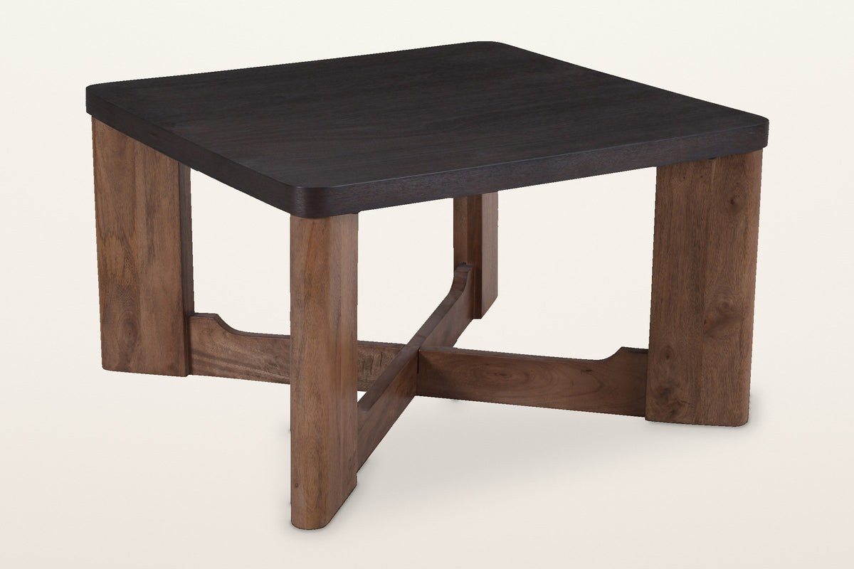 Calcata square coffee table, a mocha top on a walnut base, three-quarter view on a warm white studio backdrop