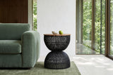 Side view of the Canale side table in Black beside a sage velvet sofa in a London, Ontario house above the Thames ravine