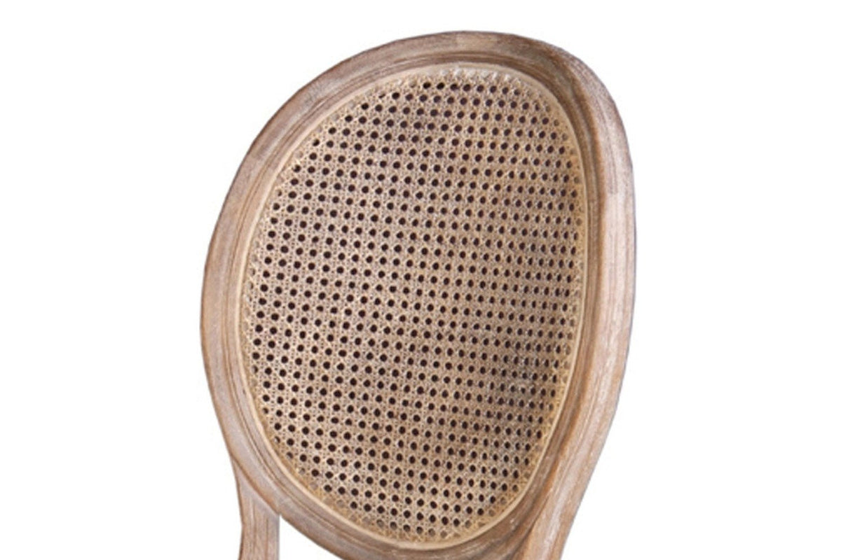 Close-up of the Candelo back: woven cane in an oval, moulded oak frame
