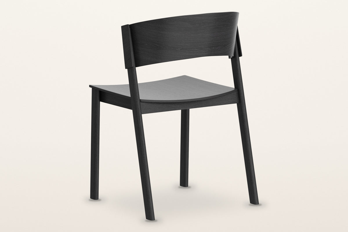 Canelli dining chair in black from behind: the curved back band, the two back posts and the seat rail