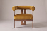 Caorle accent chair in mustard yellow velvet, straight front view: one round tube for the back and arms
