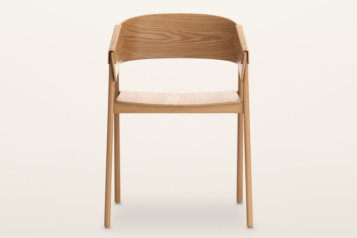 Caprarola dining armchair in natural oak, straight front view: the shell folding over both front legs