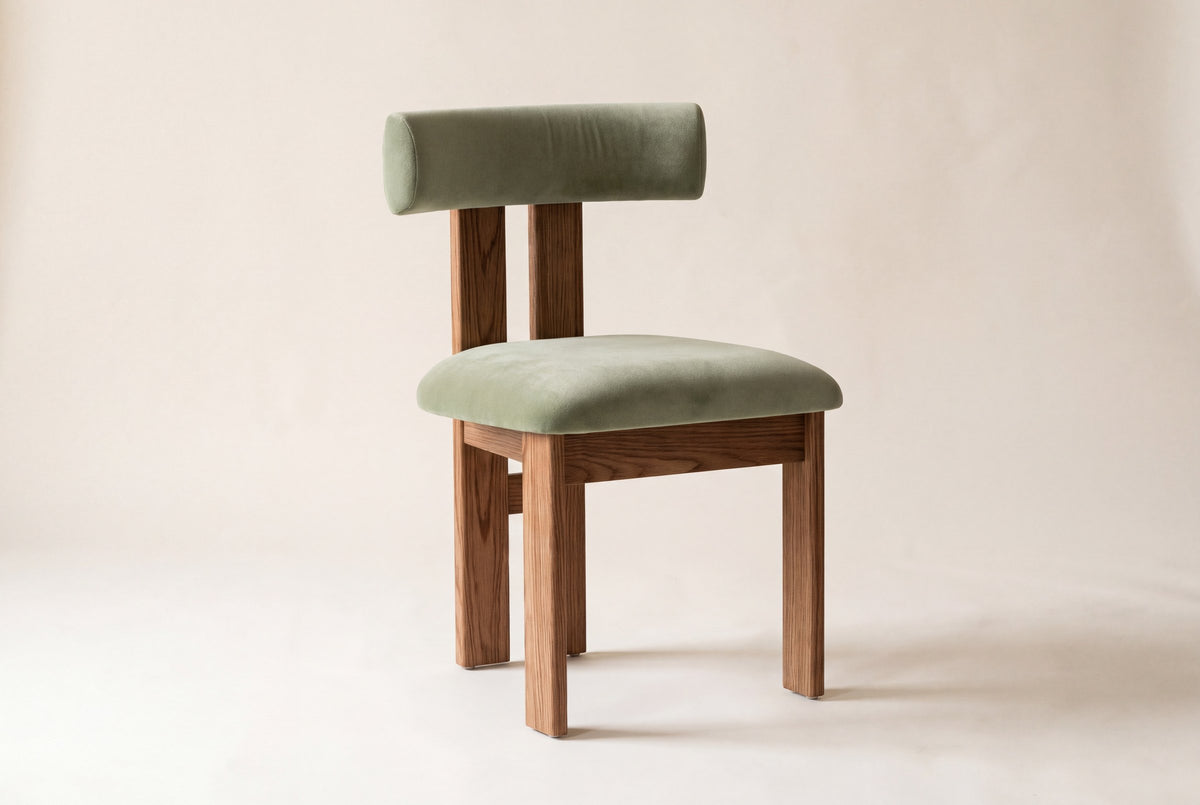 Carlo dining chair in olive green faux mohair velvet with a wire-brushed oak frame on a studio backdrop