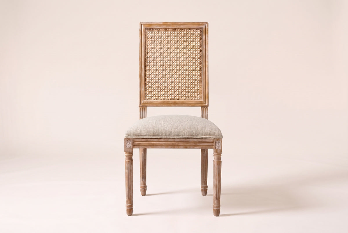 Castelfranco dining chair in Beige, straight front view showing the cane-look back