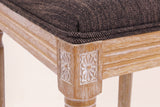Close-up of a carved rosette corner block, the reeded seat rail, a turned front leg and the Brown seat edge