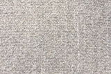 Close-up of the beige multi-tone boucle: small loops in grey and ivory with flecks of pale gold