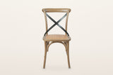 Castelmola dining chair in Natural Rustic, front view on a warm white studio backdrop