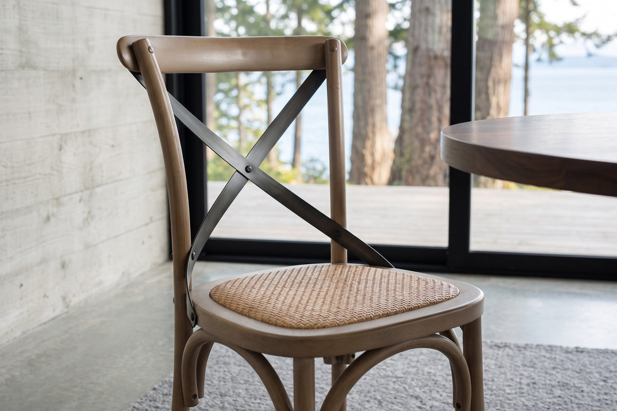 Close-up of the Castelmola seat and cross back in Sundried at seat height: the woven rattan seat in its wooden rim