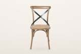 Castelmola dining chair in Sundried, front view on a warm white studio backdrop