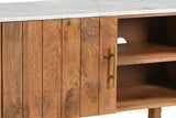 Close-up of the Ceresole left door: six vertical mango planks, an aged-gold bar pull, the edge of the white marble top