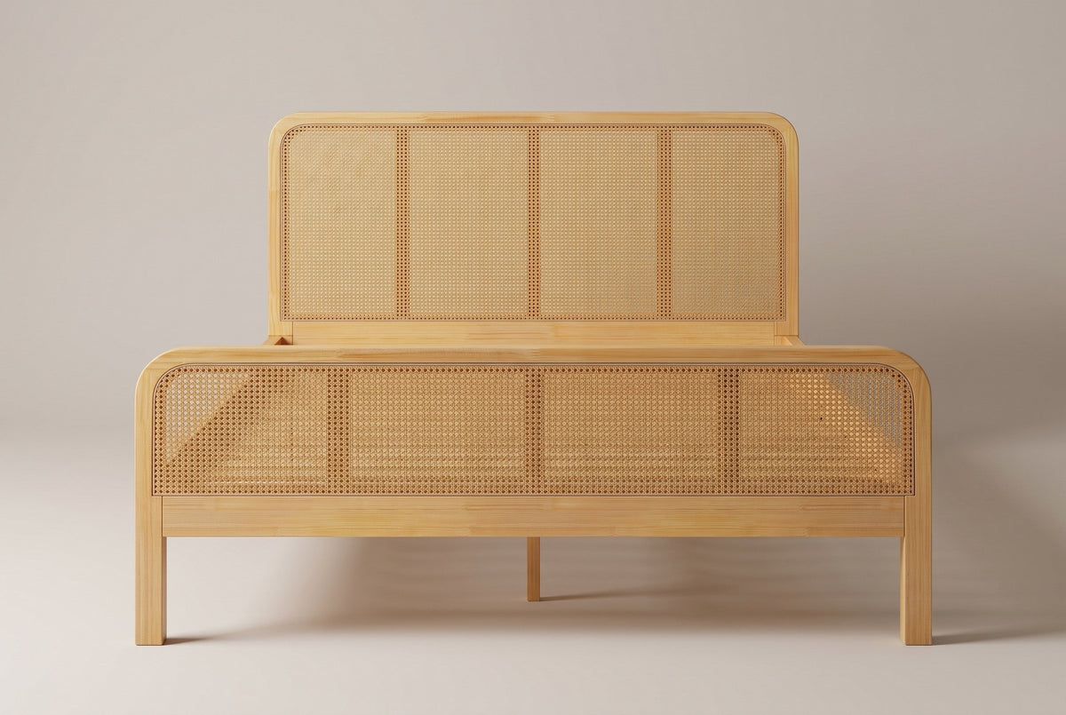Certaldo cane bed, straight front view: the lower cane-style footboard in front of the taller headboard