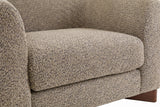 Close-up of the Light Brown boucle on the Cervia seat cushion and arm