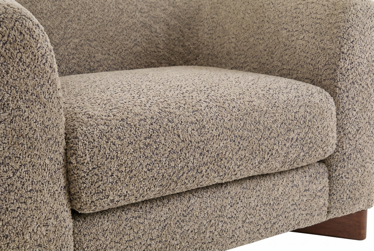 Close-up of the Light Brown boucle on the Cervia seat cushion and arm