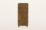 The right side of the Cervinia chest: vertical reclaimed pine planks with knots and saw marks over a low plinth