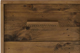 Close-up of the Cervinia nightstand's drawers: reclaimed pine planks with knots, nail holes and saw marks, and a slim wooden bar pull