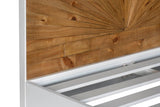 Close-up of the Cesana headboard: narrow reclaimed pine strips meeting at a small half-disc above two rows of staggered planks