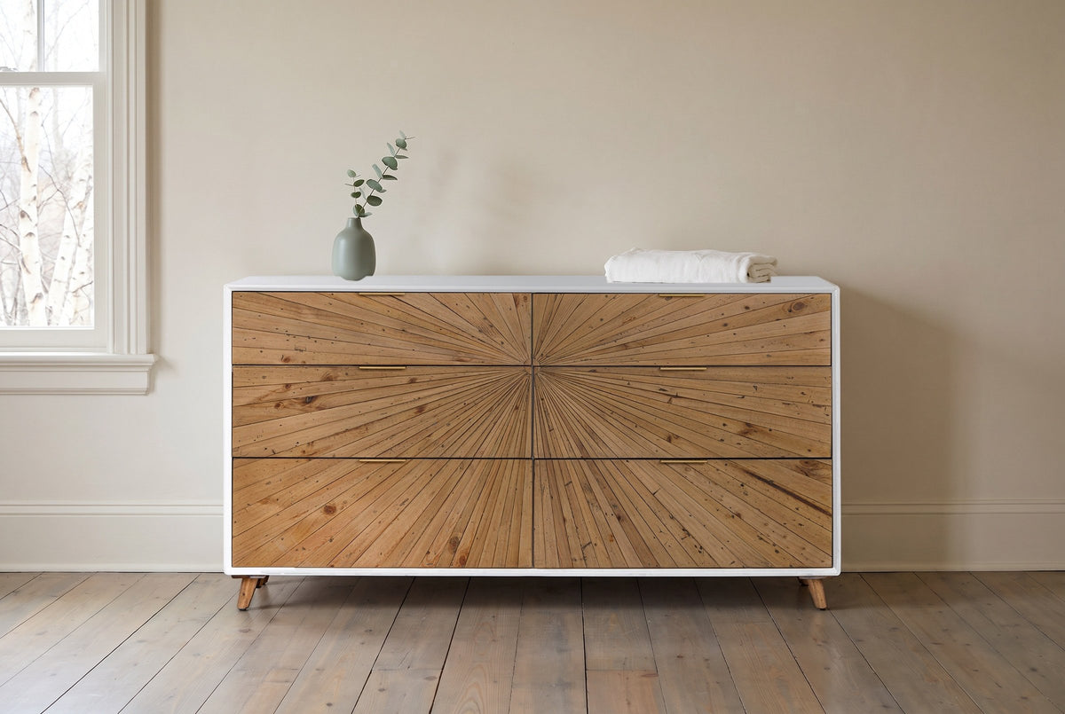 Cesana sunburst dresser against an oatmeal plaster wall in a Fredericton, New Brunswick bedroom, birches through the window