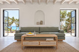 Cetara coffee table in Natural ash and wicker in a Formentera house, with white lime plaster, an arched niche