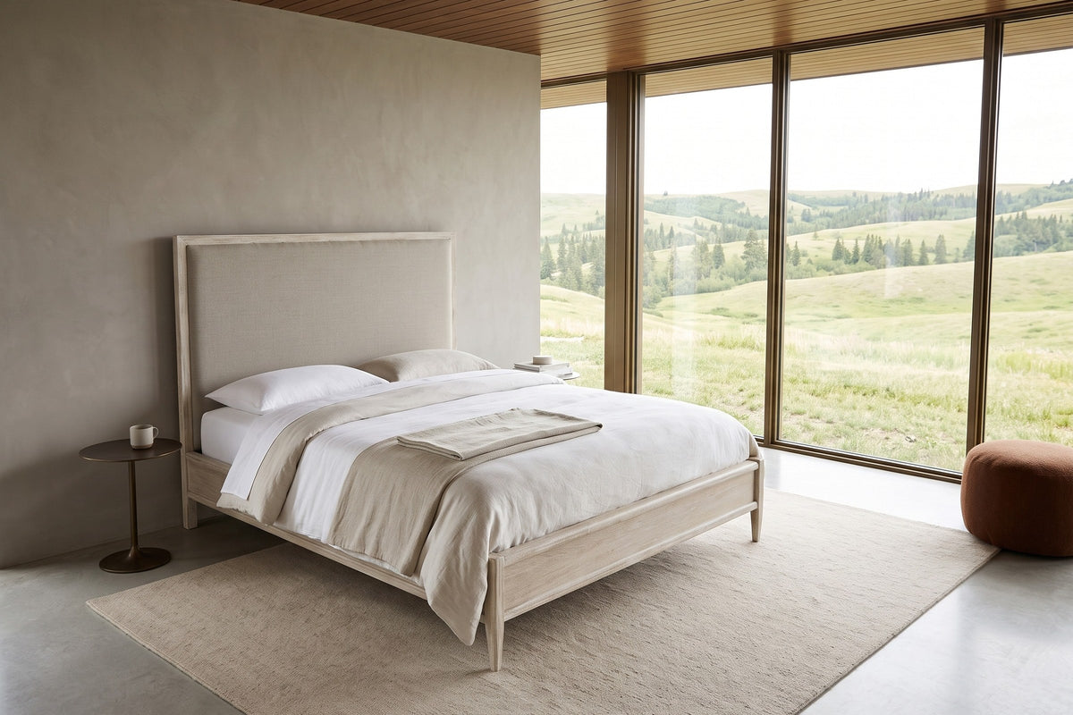 Chiusdino bed in a bedroom in a Cypress Hills house in Saskatchewan, raised three-quarter view, with greige plaster