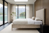 Side view of the Chiusdino bed in a bedroom in a Desolation Sound house
