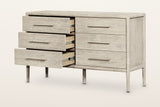 Chiusdino dresser with the three left drawers pulled out, on a warm white studio backdrop