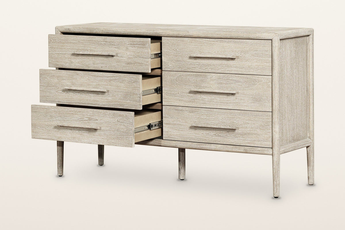Chiusdino dresser with the three left drawers pulled out, on a warm white studio backdrop