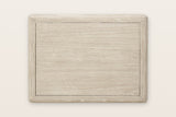 Chiusdino nightstand seen from above on a warm white ground: a flat top inside a rounded frame with softly rounded corners