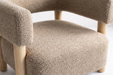 Close-up of the Light Camel boucle seat and the squared-off arm of the Cingoli chair