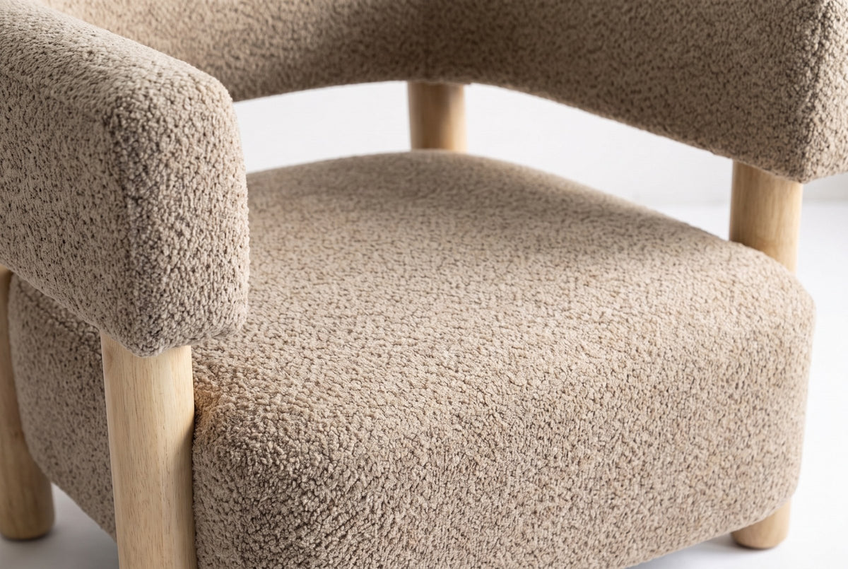 Close-up of the Light Camel boucle seat and the squared-off arm of the Cingoli chair