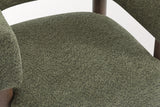 Close-up of the Olive Green boucle seat and the squared-off arm of the Cingoli chair