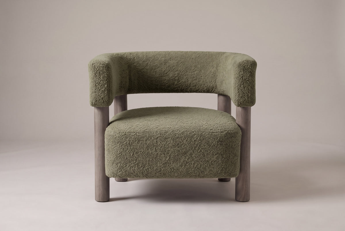 Cingoli chair in Olive Green boucle, straight front view: one curved back-and-arm band on four round wood legs