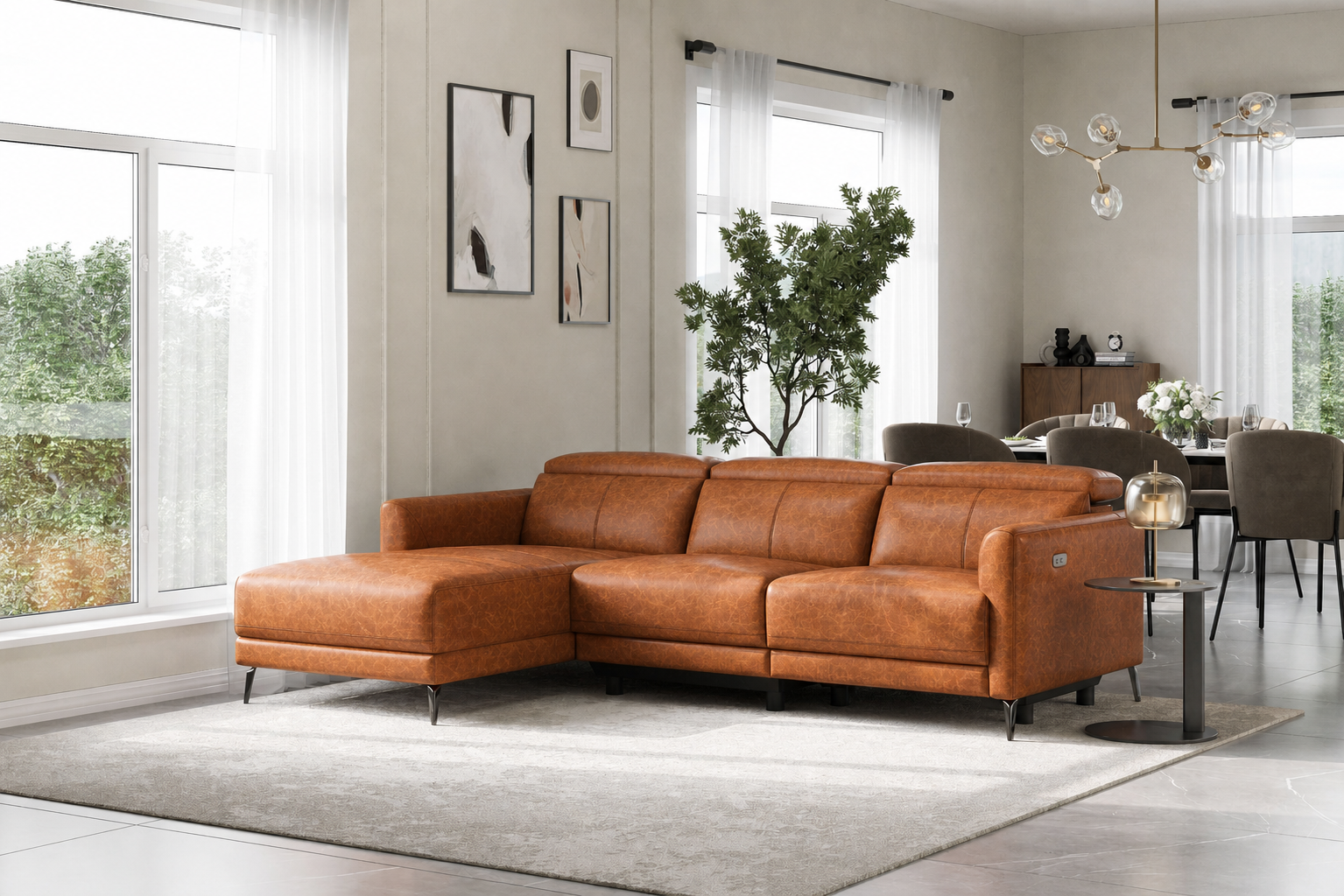 Angled view of the Andria cognac leather left-facing chaise sectional in a bright living room
