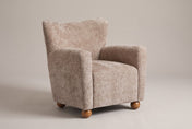 Collodi wingback accent chair in Beige Brown chenille, three-quarter view on a warm grey studio backdrop