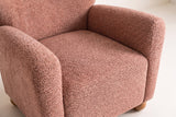 Close-up of the Collodi seat and the inside of the round arms in Coral