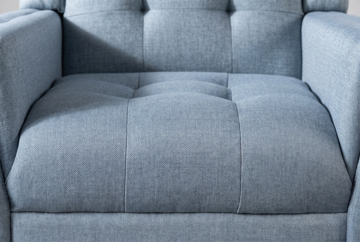 Close-up of the tufted blue seat and lower back, with the sewn tufts and the woven twill fabric