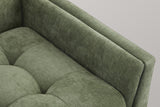 Close-up of the green chenille arm and tufted seat, with the sewn tufts and the soft pebble-weave texture
