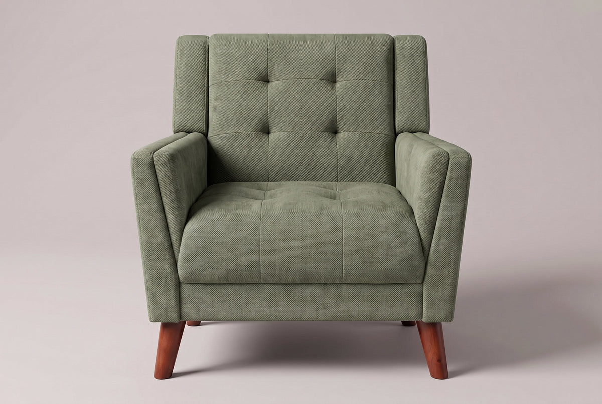 Comacchio armchair in green, straight front view: tufted back between two upright posts, flared track arms
