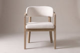 Corinaldo dining chair in Beige, straight front view on a studio backdrop