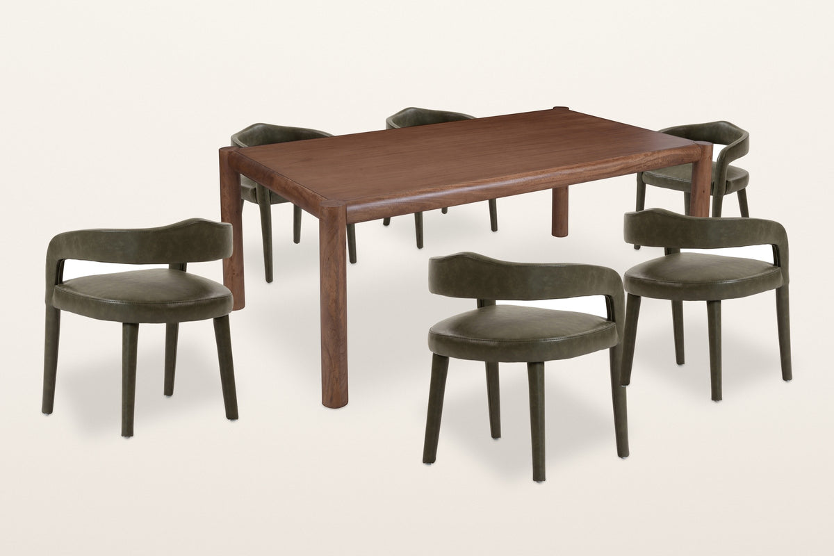 Corniglia 7-piece dining set, three-quarter view on a warm white studio backdrop: the walnut mango table with round legs and round rails and six moss faux leather armchairs