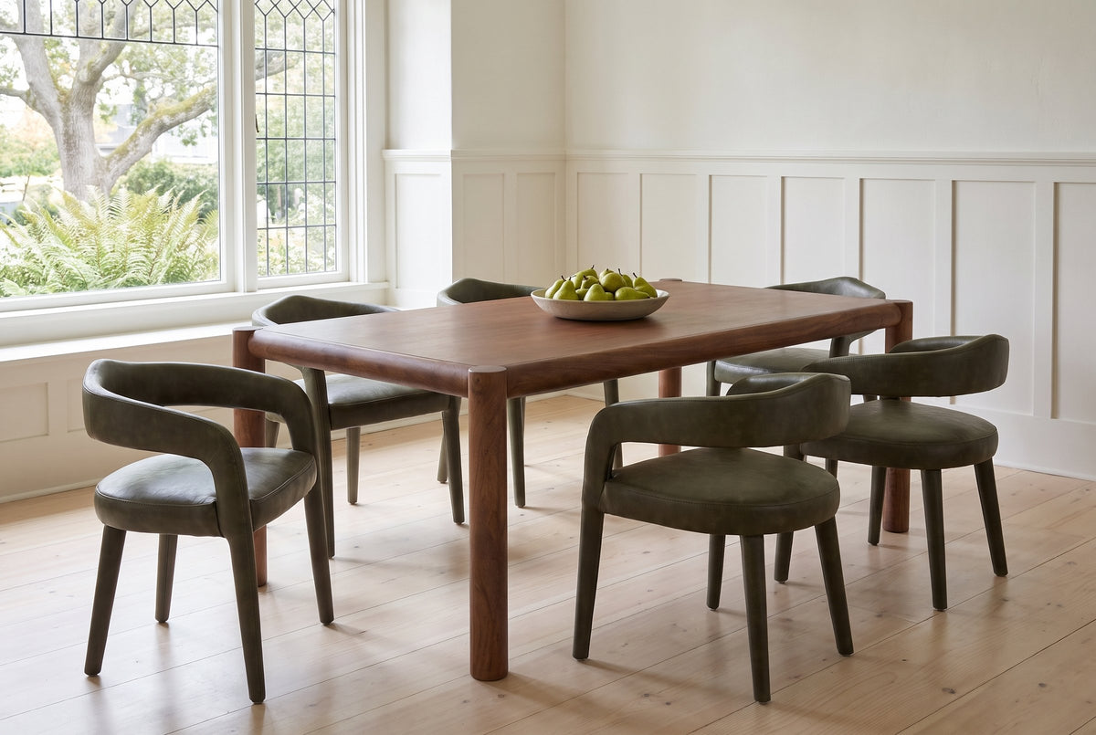 Corniglia dining set in an Oak Bay house in Victoria with white panelled walls and a fern garden through the leaded window