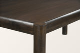 Close-up of a Corniglia corner in mocha: the round leg top, the rounded rails and the dark espresso finish