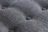 Button tufting on the Corwin Charcoal textured fabric