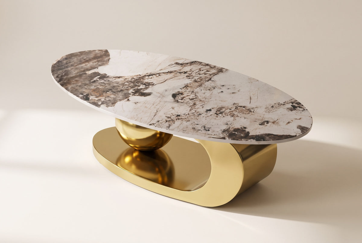 The Cosima coffee table from above at an angle, showing the bold brown, charcoal and tan veining across the white stone top