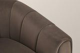 Close-up of a channelled velvet arm and its rolled front edge in dark brown