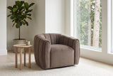 Cuneo swivel chair in dark brown velvet beside a pale oak side table in a bright Vancouver living room
